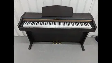 Roland HP101e Digital Piano in rosewood weighted keys 3 pedals, stock # 24272